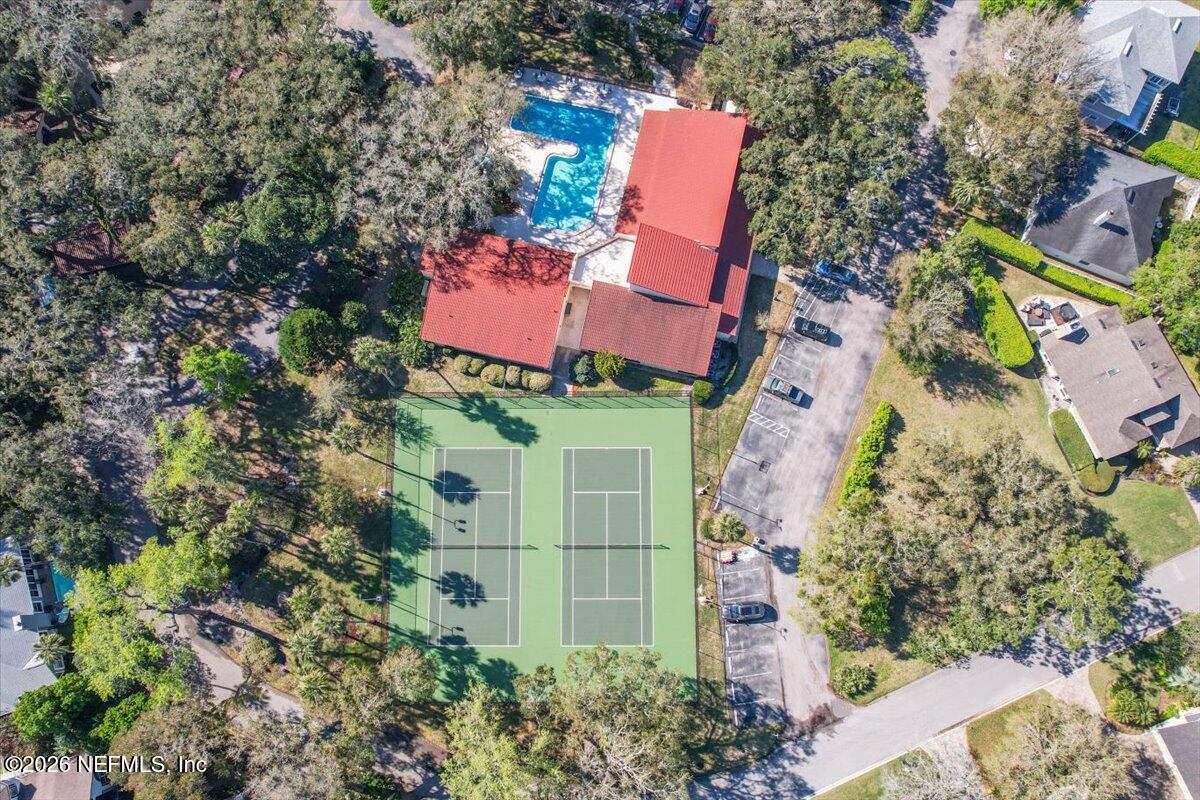 1810 Sevilla Boulevard West, Unit 310 Atlantic Beach, FL 32233 - Photo 17 of 18 an aerial view of residential house with outdoor space and swimming pool