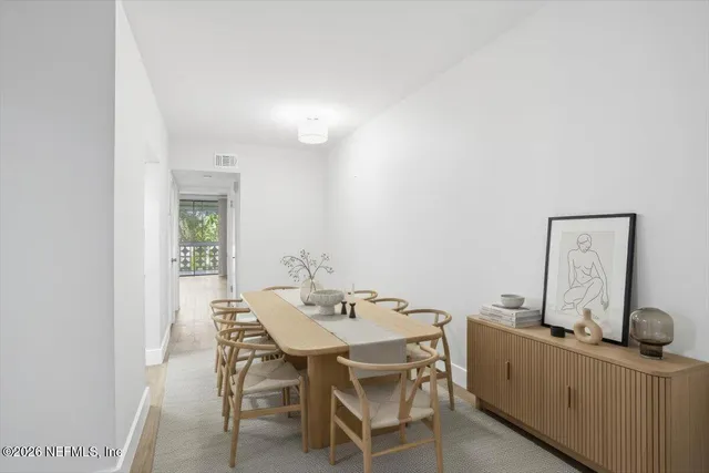 a view of a dining room with furniture