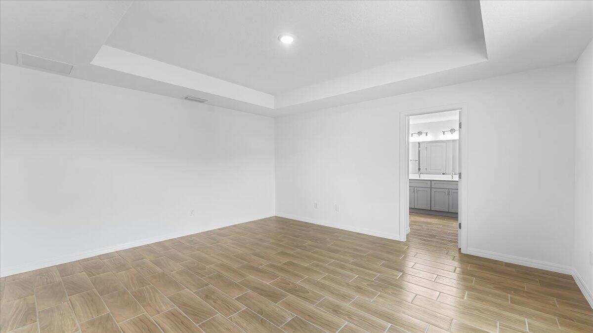 1938 Jupiter Boulevard Southwest Palm Bay, FL 32908 - Photo 19 of 41 wooden floor in a room