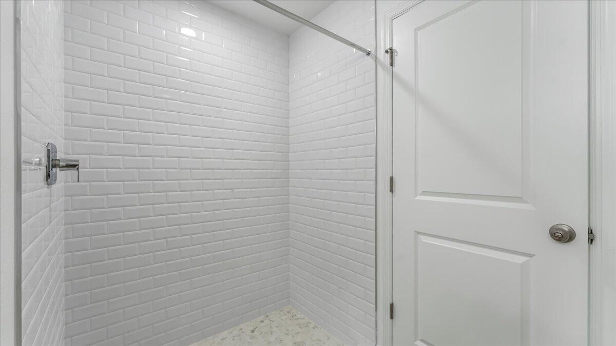 1938 Jupiter Boulevard Southwest Palm Bay, FL 32908 - Photo 21 of 41 a bathroom with a shower
