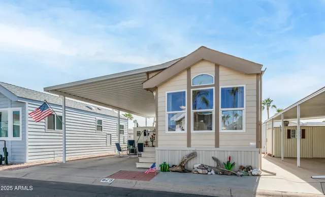 a front view of a house with garage