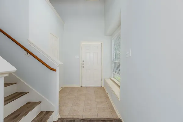 a view of hallway with stairs