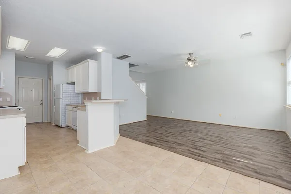 a view of a kitchen with a sink