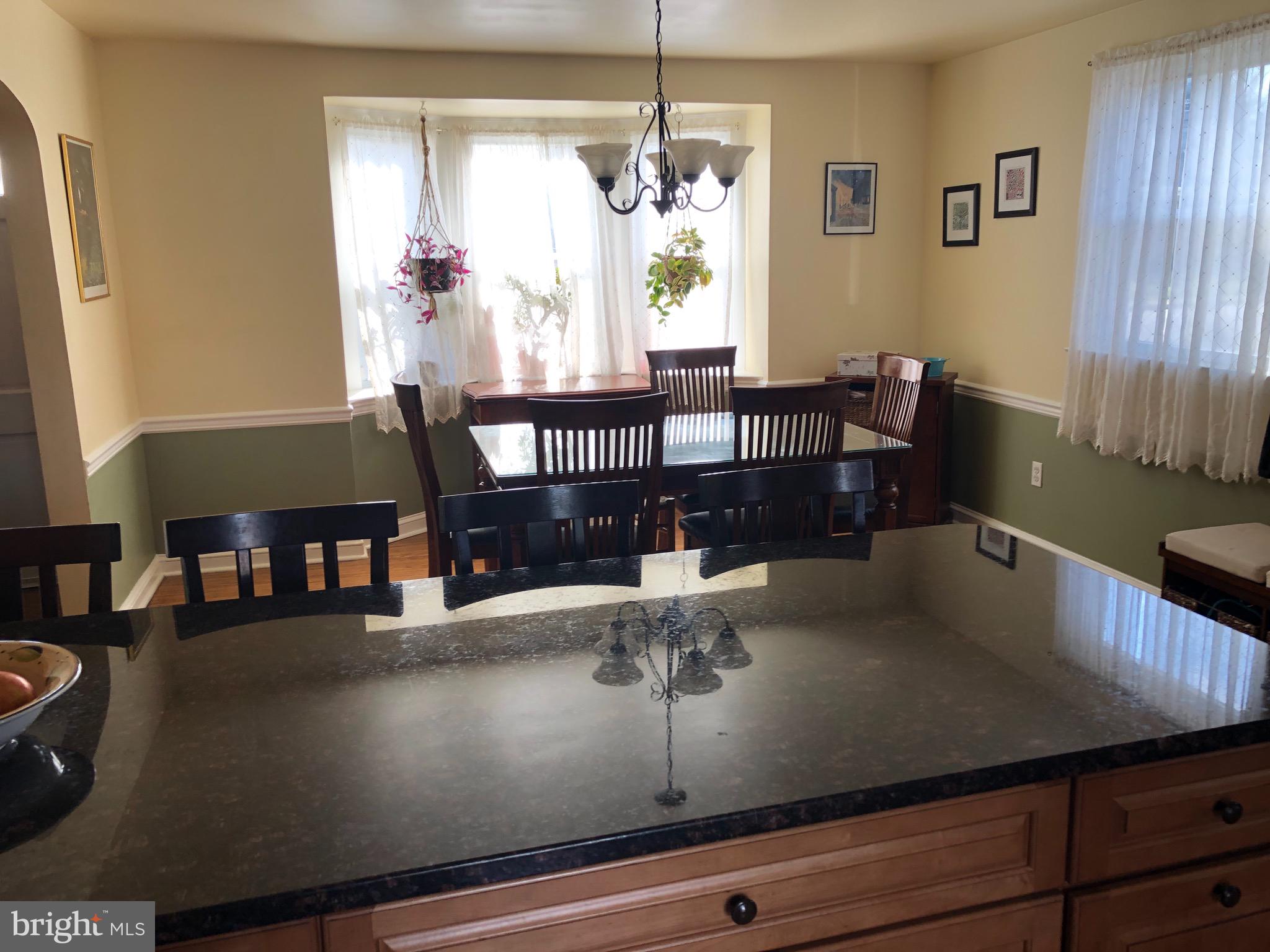 963 Providence Road Springfield, PA 19064 - Photo 10 of 35 Kitchen Island into Formal Dining Room