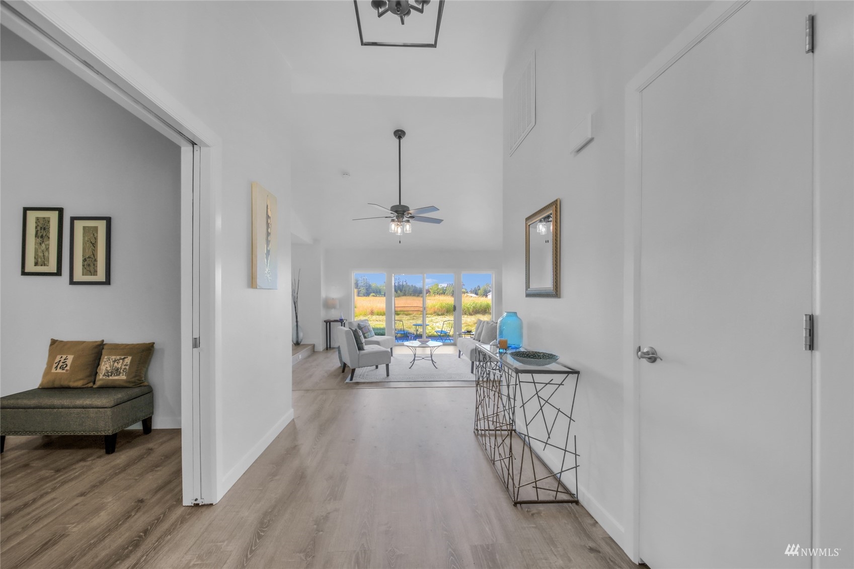 4770 Lincoln Road Blaine, WA 98230 - Photo 14 of 36 a view of a livingroom with furniture and wooden floor