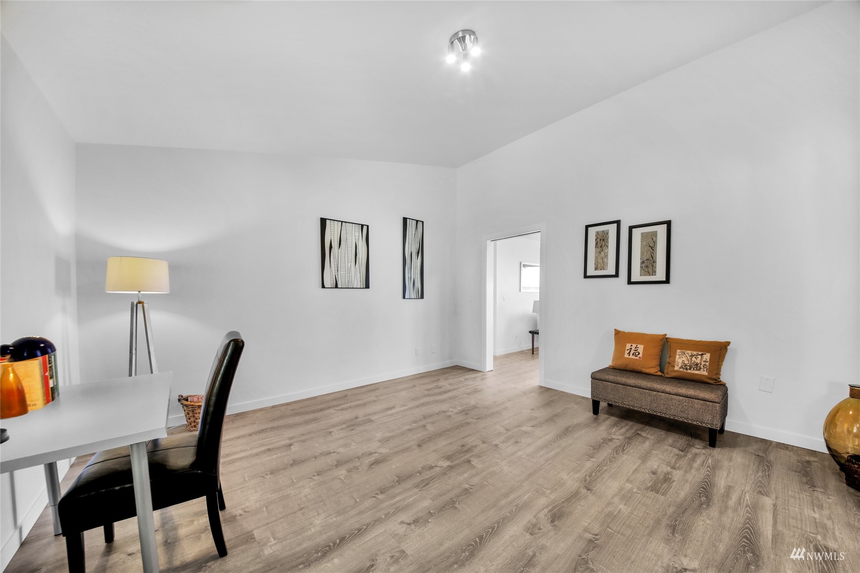 4770 Lincoln Road Blaine, WA 98230 - Photo 15 of 36 a living room with furniture and a wooden floor