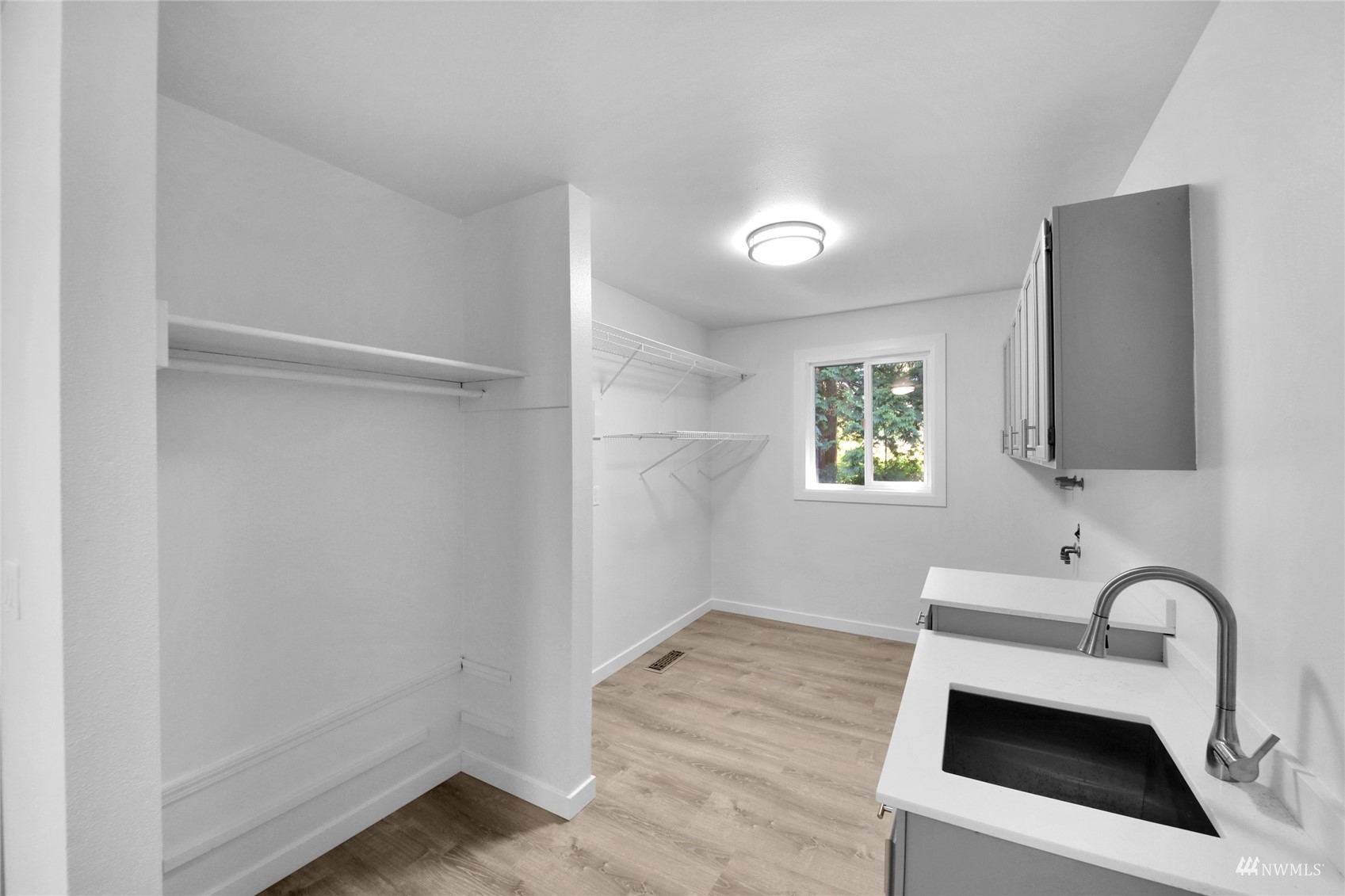 4770 Lincoln Road Blaine, WA 98230 - Photo 26 of 36 a room with a sink and a microwave