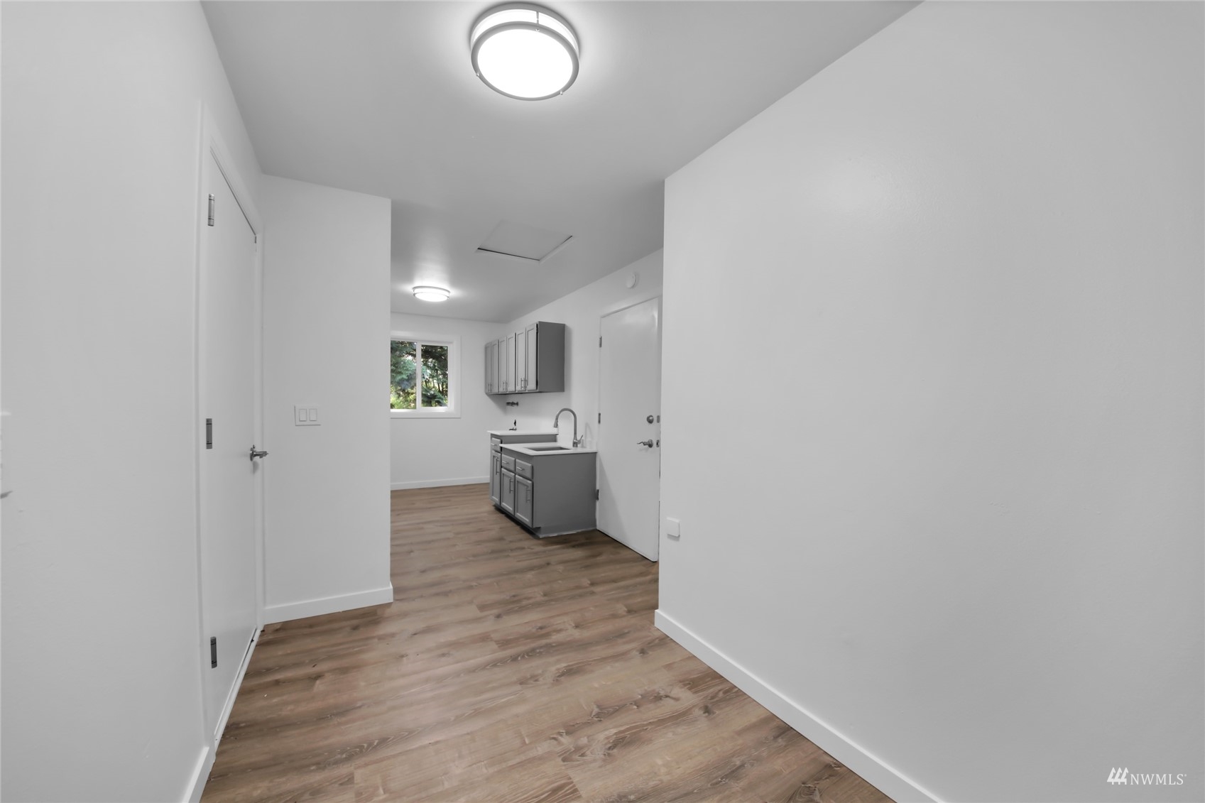 4770 Lincoln Road Blaine, WA 98230 - Photo 27 of 36 a view of a kitchen with a sink and cabinets