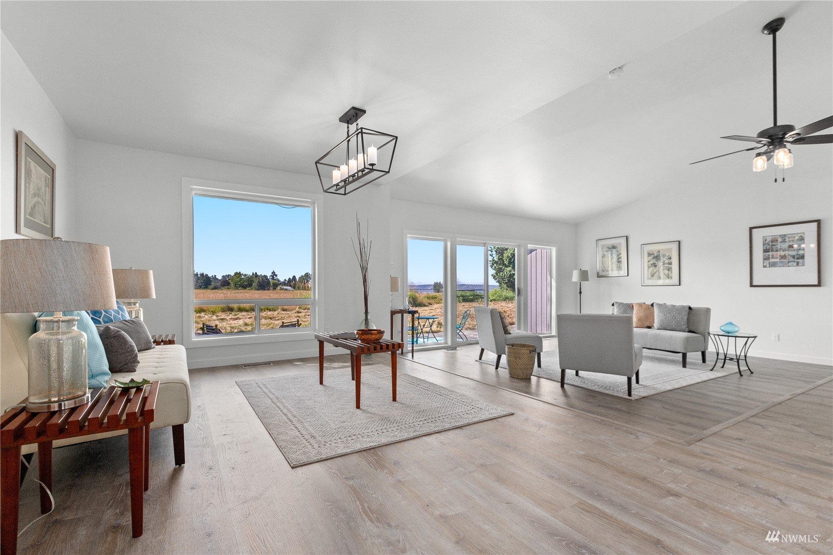 4770 Lincoln Road Blaine, WA 98230 - Photo 29 of 36 a living room with furniture and a wooden floor