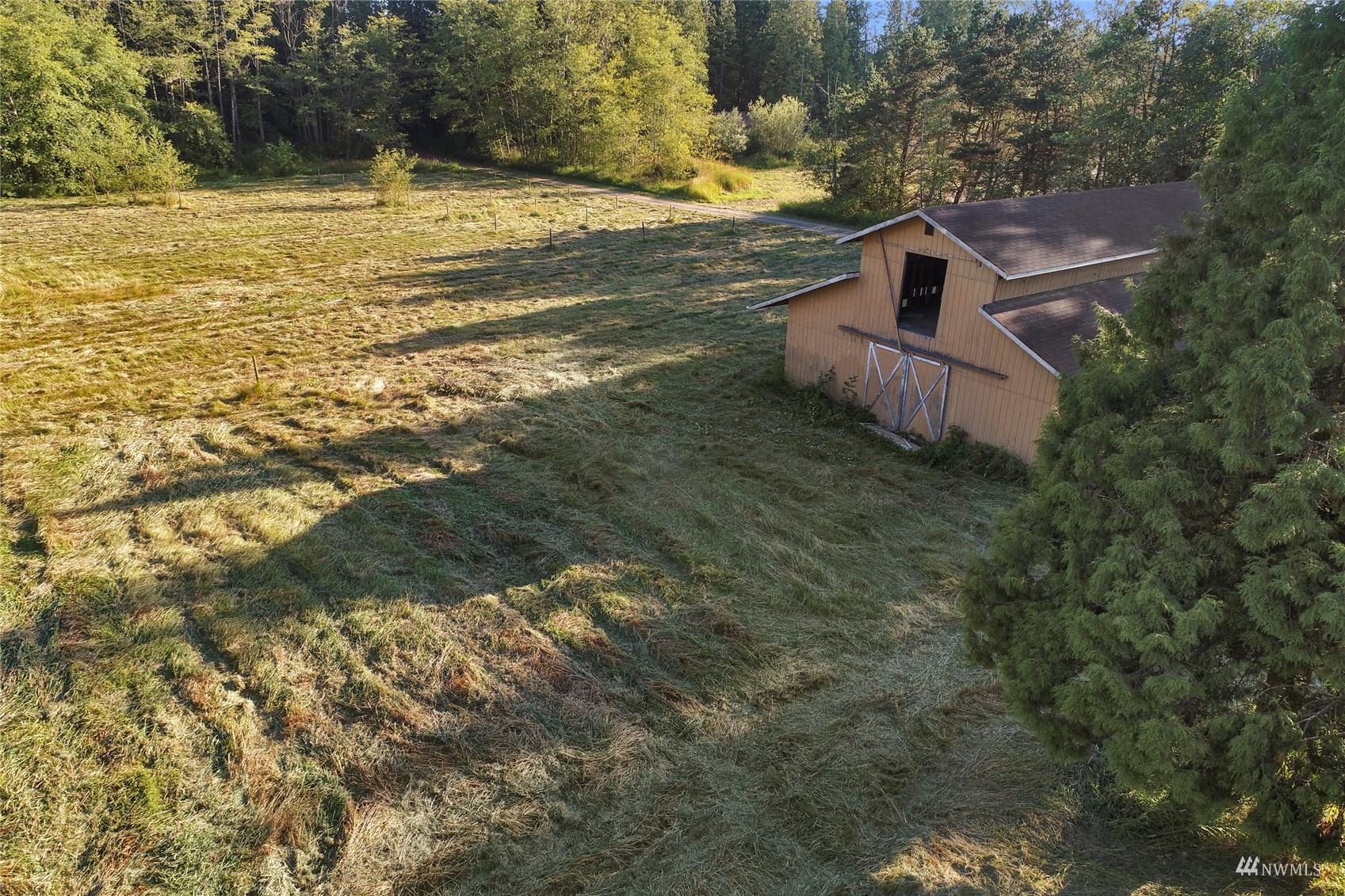 4770 Lincoln Road Blaine, WA 98230 - Photo 30 of 36 a view of a house with a yard