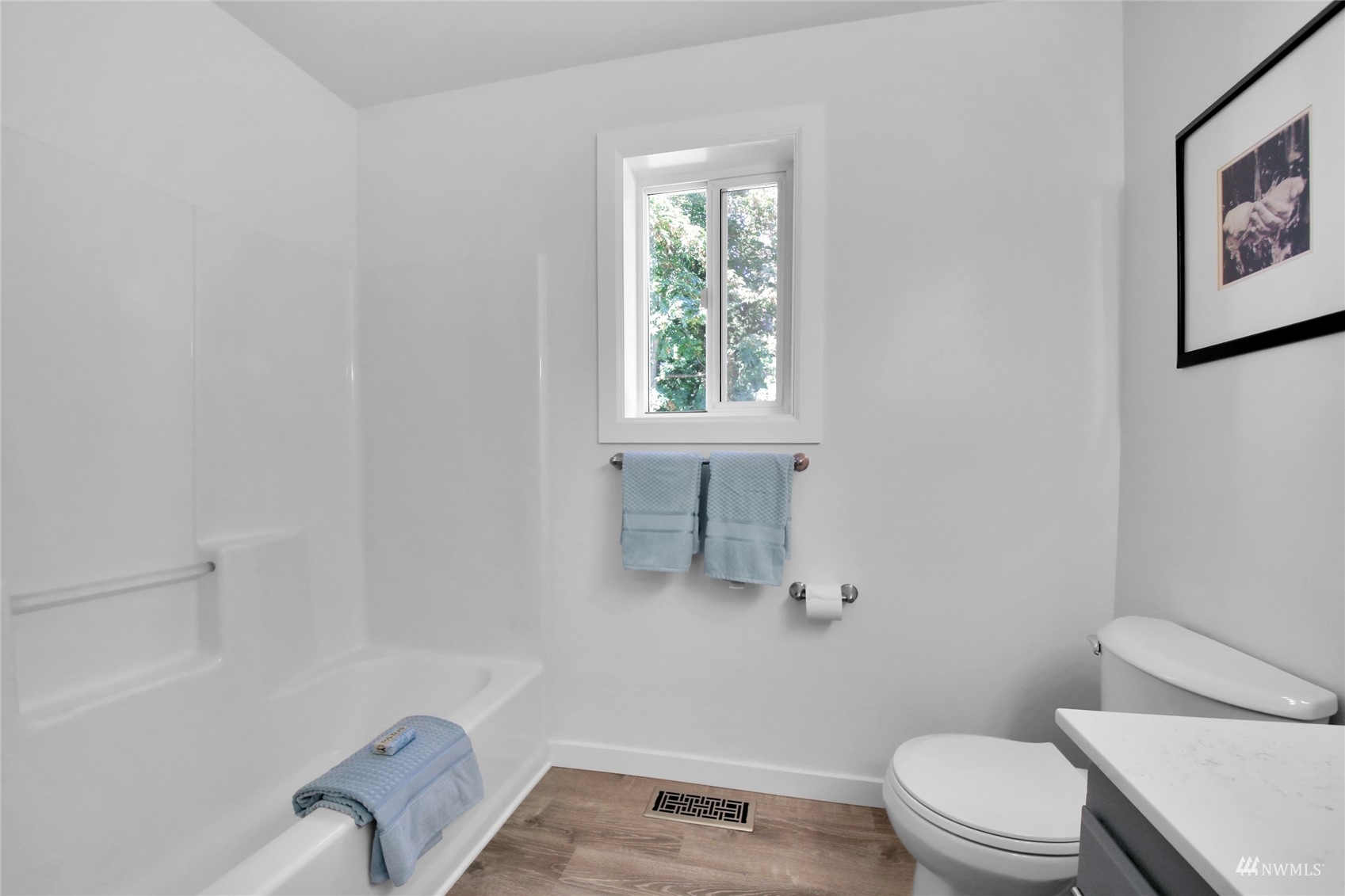 4770 Lincoln Road Blaine, WA 98230 - Photo 9 of 36 a white toilet sitting next to a bath tub