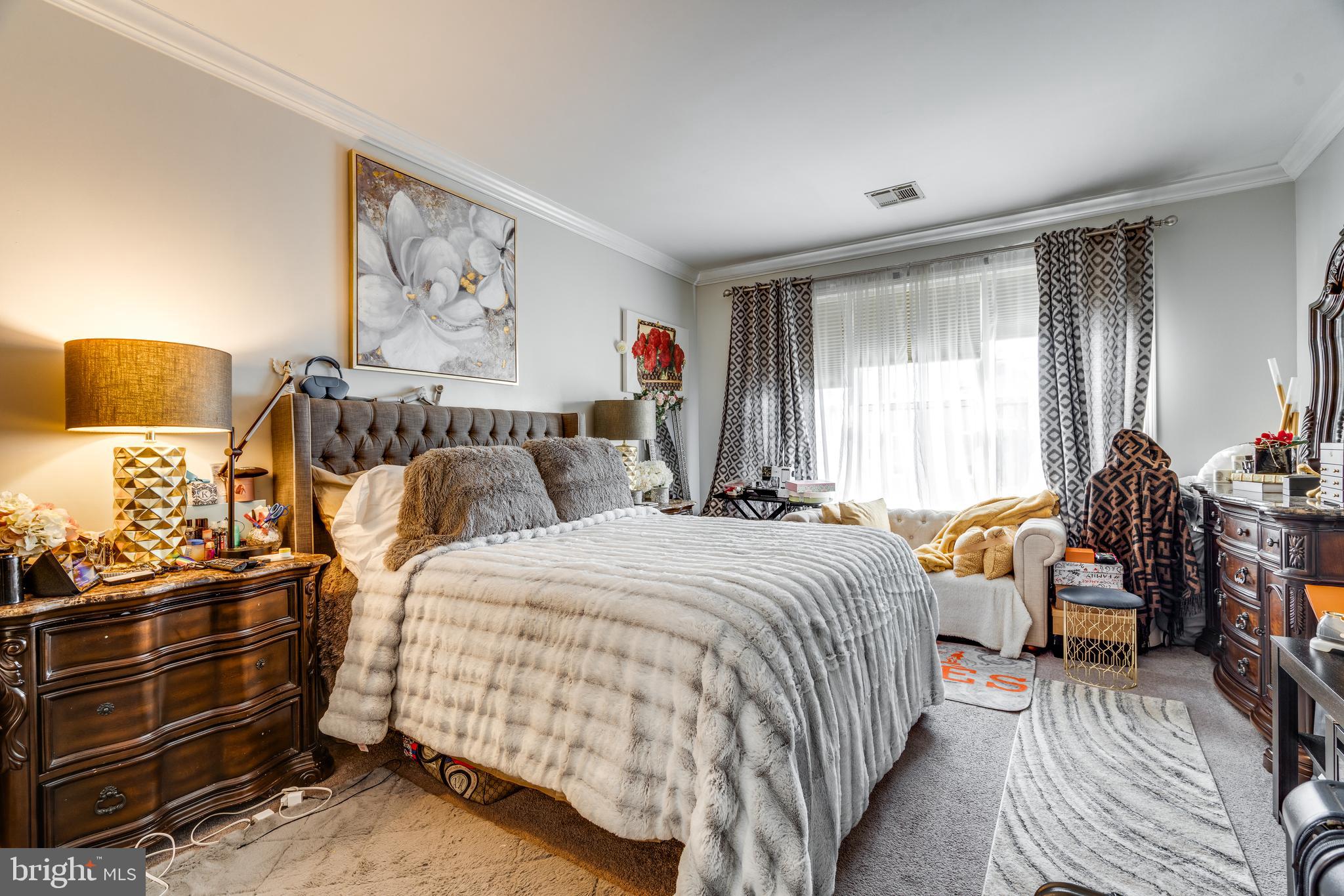 235 Masterson Court Ewing, NJ 08618 - Photo 12 of 19 a bedroom with a bed and wooden floor