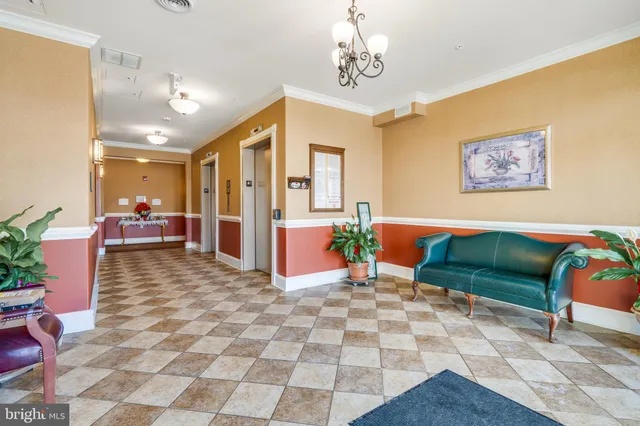 a view of a livingroom with furniture and windows