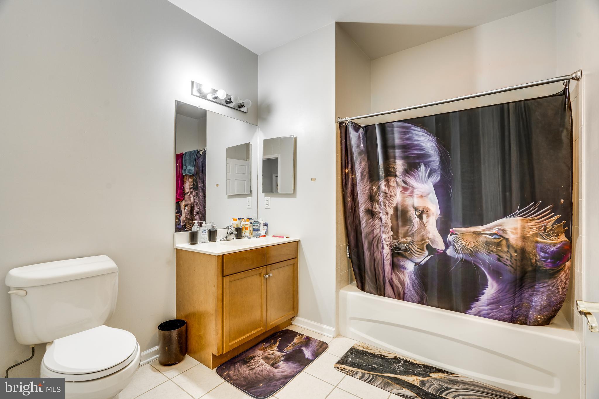 235 Masterson Court Ewing, NJ 08618 - Photo 8 of 19 a bathroom with a toilet sink and mirror