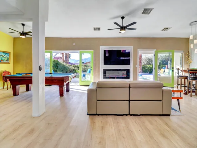 a view of a dining room with furniture window and outside view