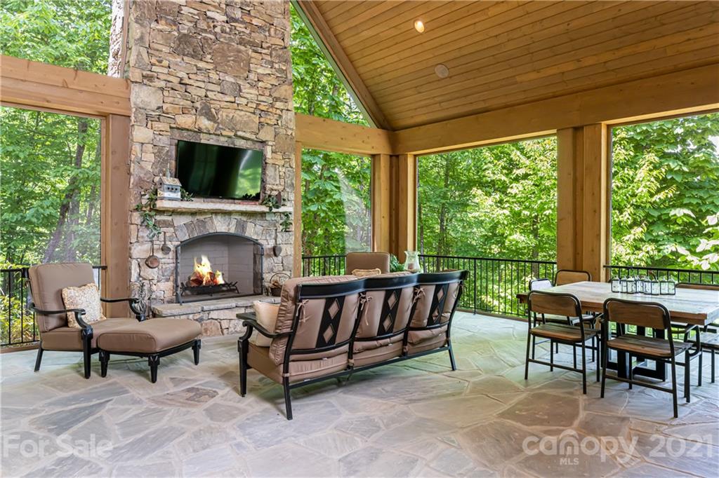 301 Flying Dutchman Road Sylva, NC 28779 - Photo 14 of 48 a living room with furniture and a fireplace