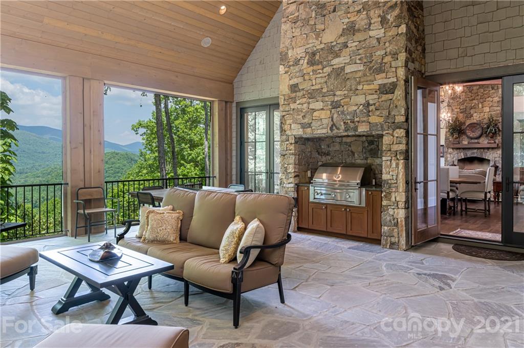 301 Flying Dutchman Road Sylva, NC 28779 - Photo 16 of 48 a living room with furniture and a fireplace