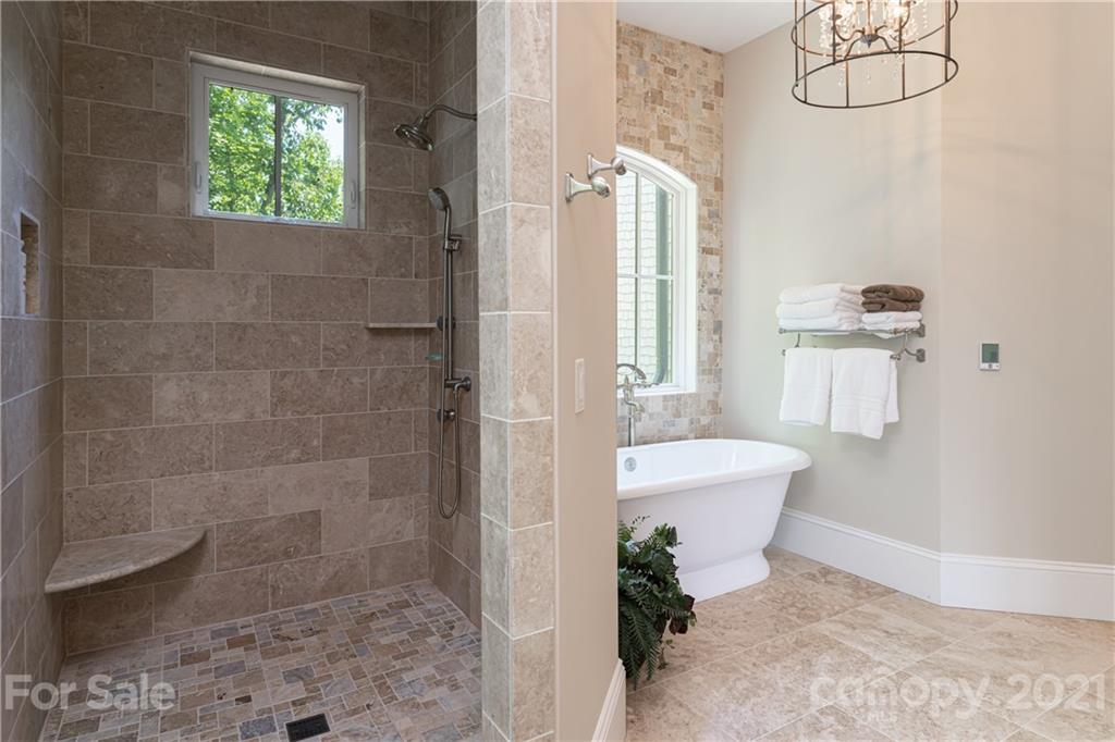 301 Flying Dutchman Road Sylva, NC 28779 - Photo 29 of 48 a bathroom with a sink a toilet and a shower