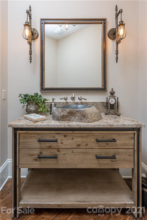 301 Flying Dutchman Road Sylva, NC 28779 - Photo 34 of 48 a bathroom with a sink and a mirror