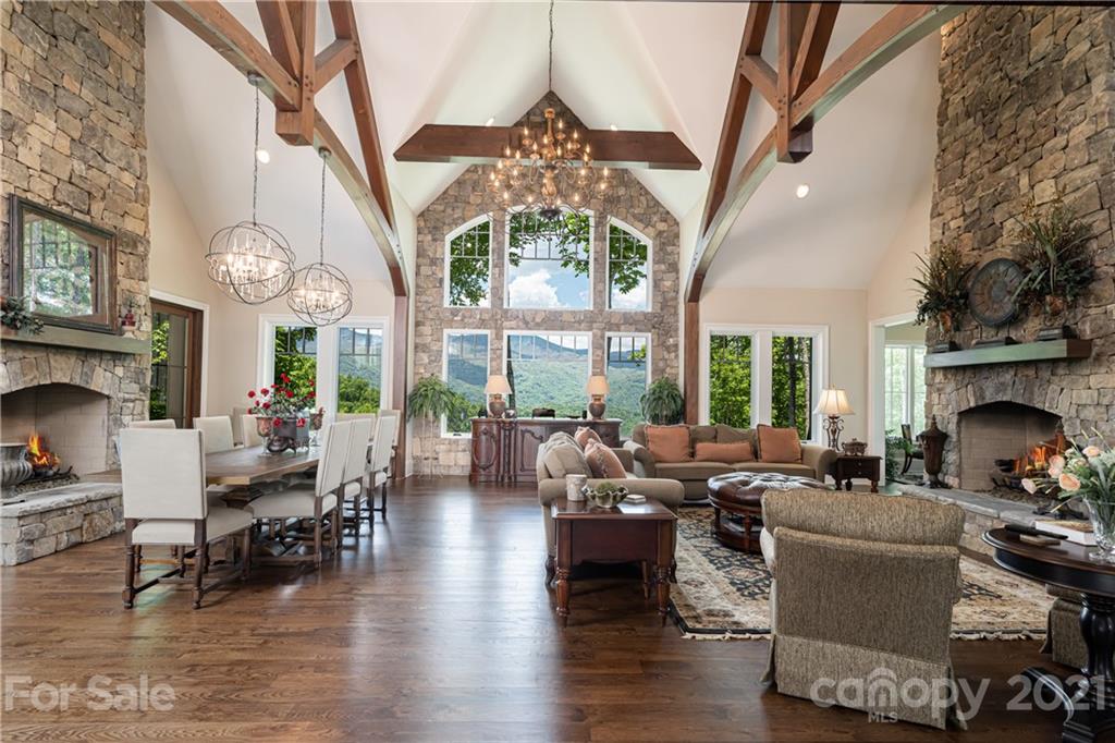 301 Flying Dutchman Road Sylva, NC 28779 - Photo 6 of 48 a living room with fireplace furniture and a large window