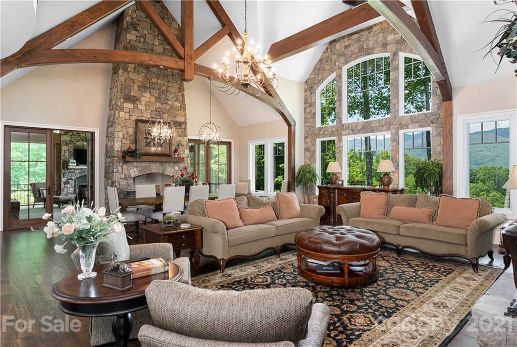 301 Flying Dutchman Road Sylva, NC 28779 - Photo 8 of 48 a living room with patio furniture and a large window