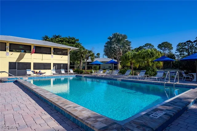 a view of a chairs and table in the garden