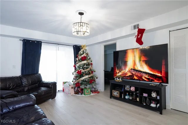 a bedroom with bed and a window