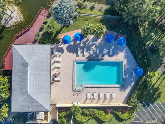 an aerial view of a house having yard