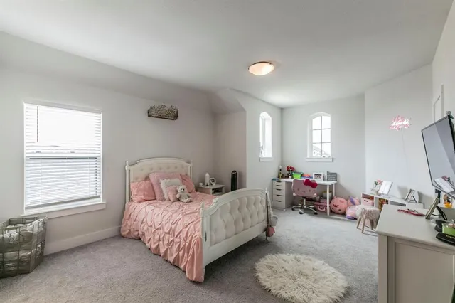 a view of an entryway with wooden floor and stairs