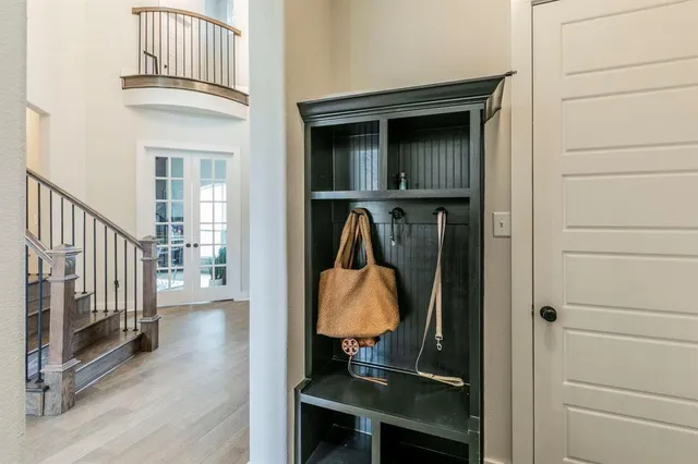 a view of a house with backyard porch and sitting area