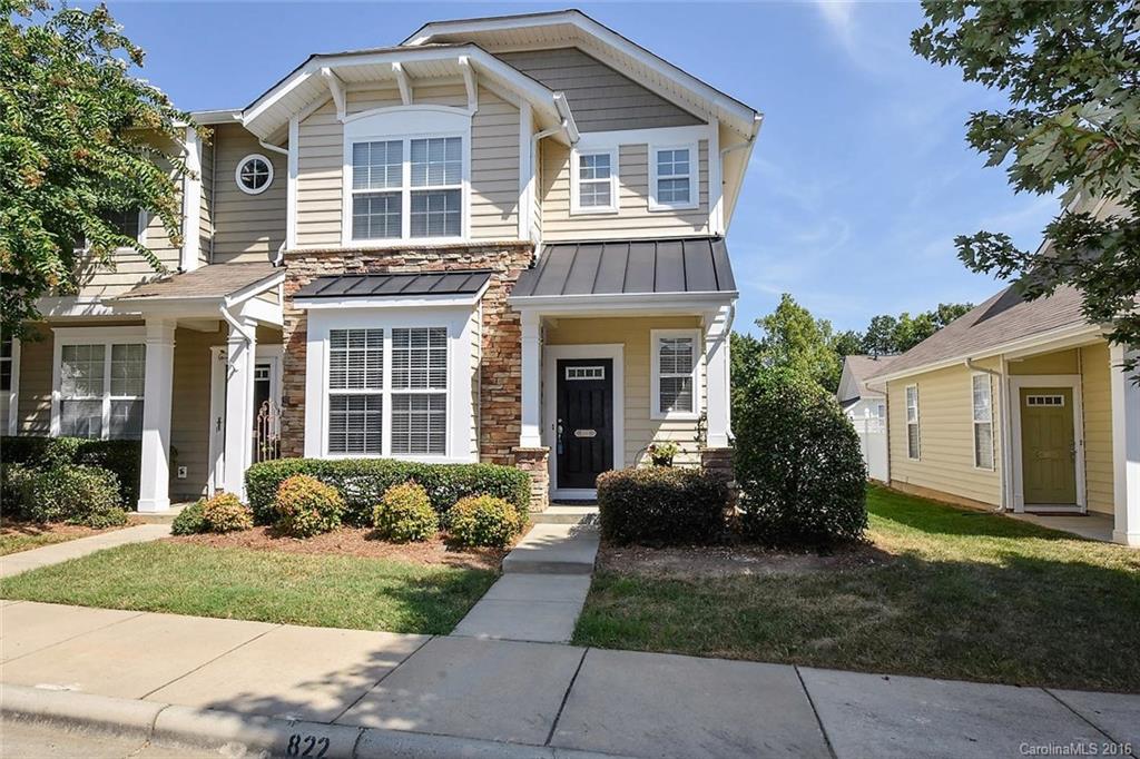 822 Gentlewinds Court, Unit 143 Fort Mill, SC 29708 - Photo 1 of 21 front view of a house with a yard