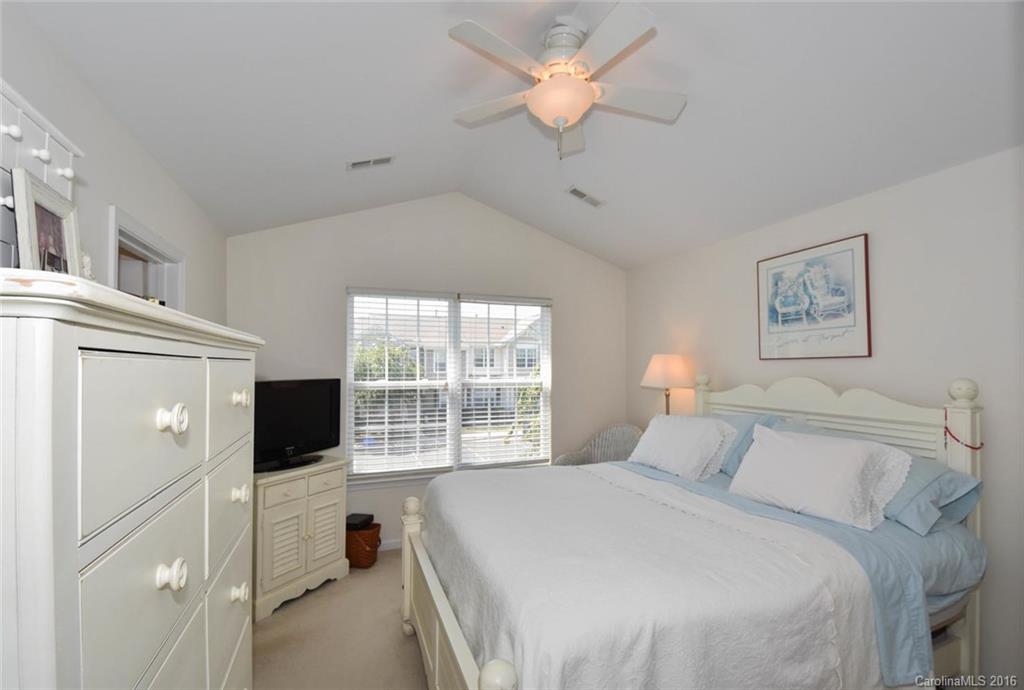 822 Gentlewinds Court, Unit 143 Fort Mill, SC 29708 - Photo 13 of 21 a bedroom with a bed and a window