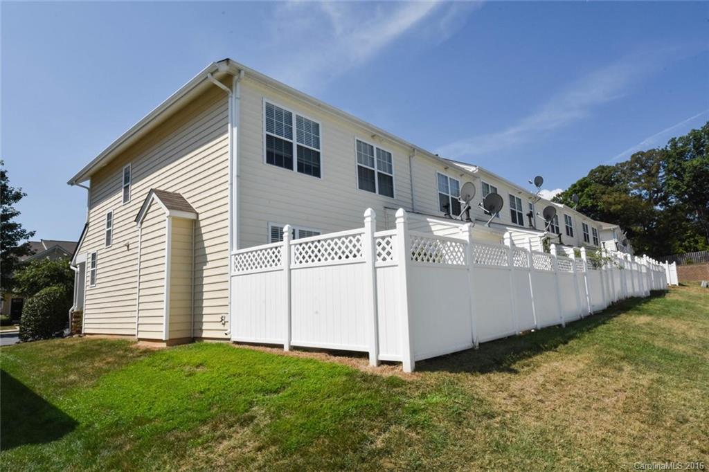 822 Gentlewinds Court, Unit 143 Fort Mill, SC 29708 - Photo 18 of 21 a view of a house with backyard