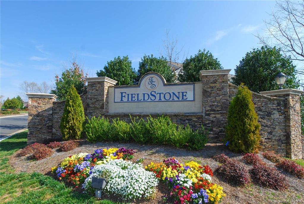 822 Gentlewinds Court, Unit 143 Fort Mill, SC 29708 - Photo 19 of 21 a view of sign board with plants in the background