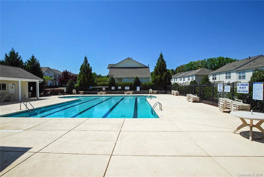 822 Gentlewinds Court, Unit 143 Fort Mill, SC 29708 - Photo 21 of 21 a view of yard with swimming pool and furniture