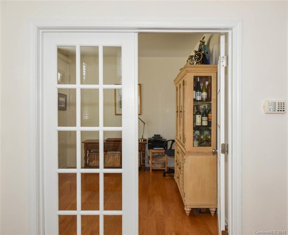 822 Gentlewinds Court, Unit 143 Fort Mill, SC 29708 - Photo 6 of 21 a view of walk in closet with living room