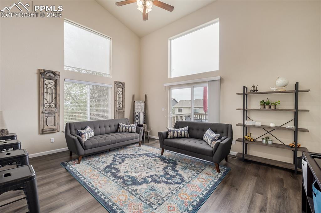 4966 Spokane Way Colorado Springs, CO 80911 - Photo 5 of 35 a living room with furniture and a large window