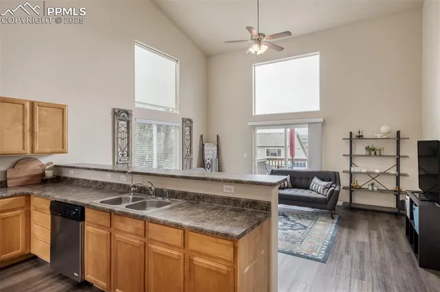 a spacious bathroom with a granite countertop sink and a large mirror
