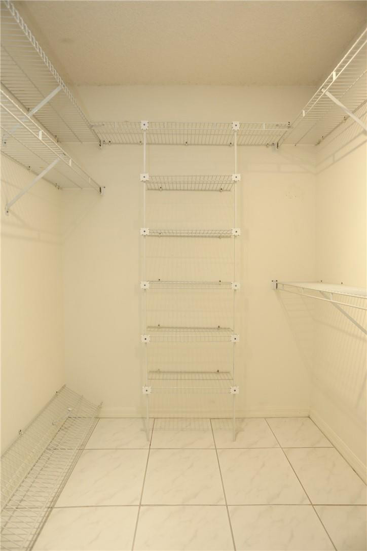 11095 Autoro Court, Unit 11095 Boca Raton, FL 33498 - Photo 24 of 45 Master bedroom has two closets.