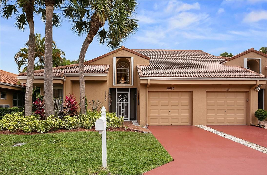 11095 Autoro Court, Unit 11095 Boca Raton, FL 33498 - Photo 3 of 45 Corner villa with one car garage.