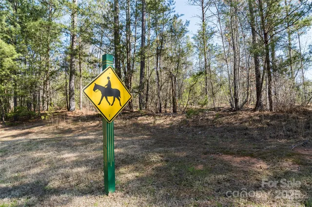 a sign that is on the side of the road