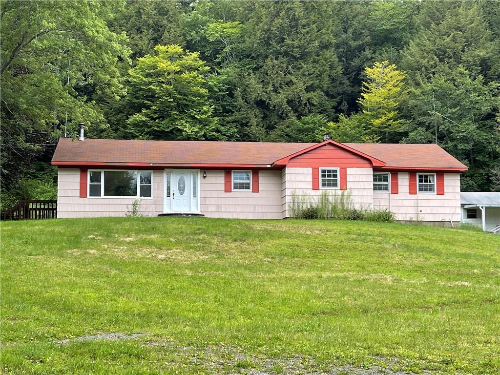 16 John Gray Road Livingston Manor, NY 12758 - Photo 1 of 1 a front view of a house with a garden