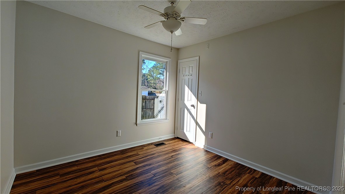 704 South Bethel Road Raeford, NC 28376 - Photo 23 of 32 a view of an empty room with a window