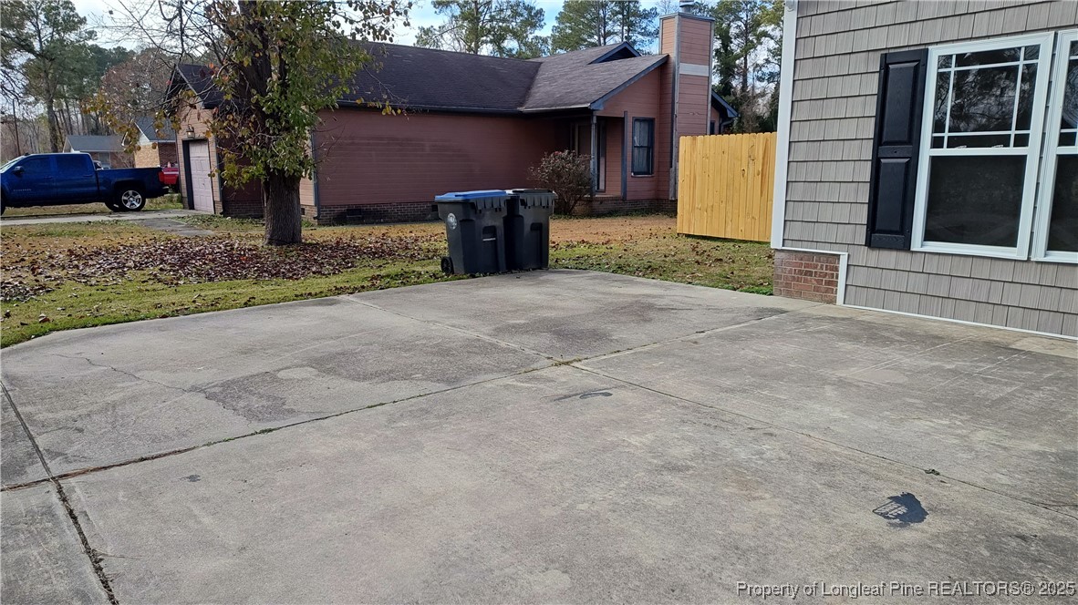 704 South Bethel Road Raeford, NC 28376 - Photo 32 of 32 a front view of a house with a yard