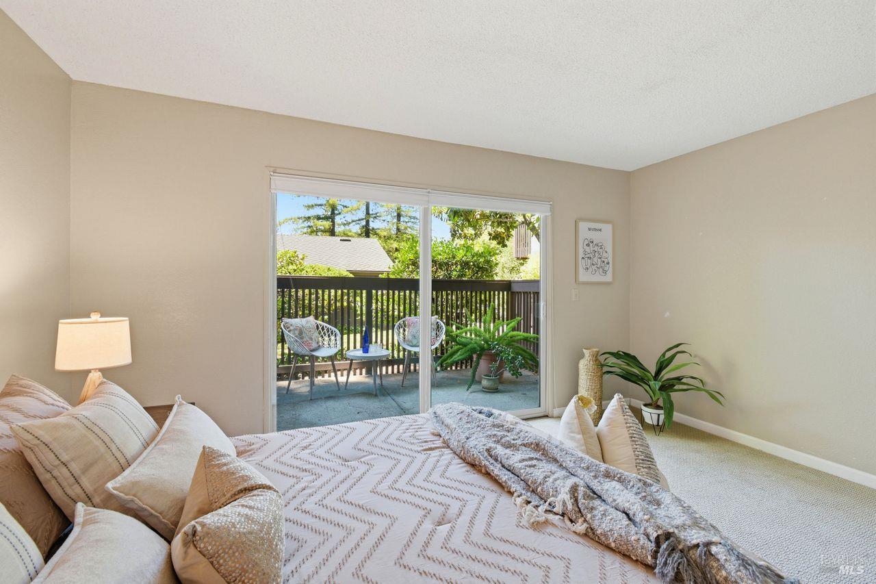 300 Los Alamos Road, Unit 104 Santa Rosa, CA 95409 - Photo 21 of 41 The larger bedroom and living room both open to patios.