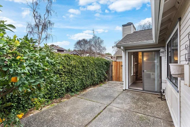 a backyard of a house with lots of green space