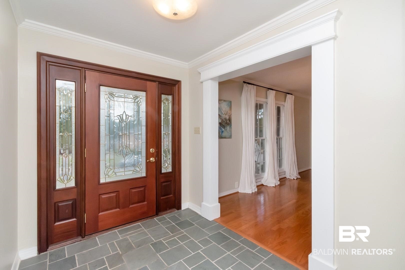 1229 West Chimney Top Drive Mobile, AL 36695 - Photo 3 of 36 Entrance foyer featuring dark hardwood / wood-style floors and ornamental molding
