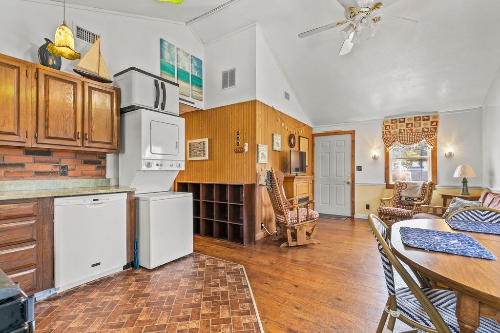 17 Wixon Road Dennis, MA 02639 - Photo 16 of 25 a living room with furniture a dining table and chairs with wooden floor