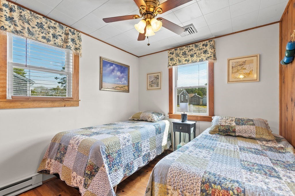 17 Wixon Road Dennis, MA 02639 - Photo 21 of 25 a bedroom with two beds and a window