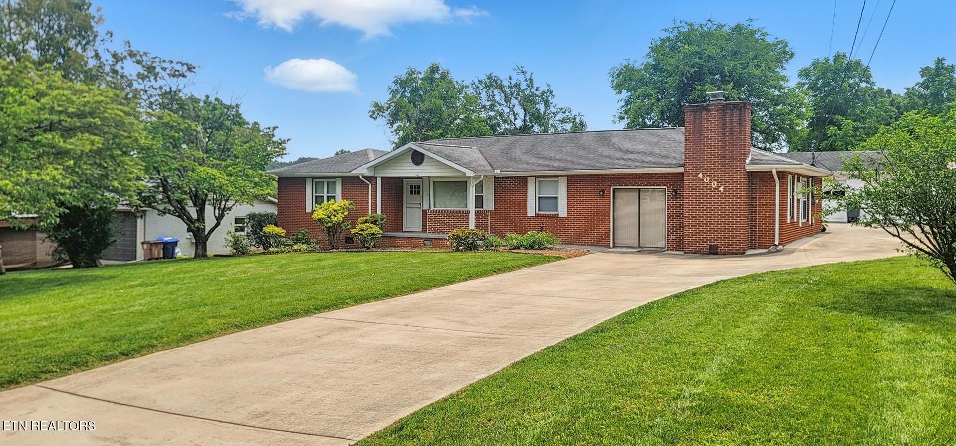 4004 Deerfield Road Knoxville, TN 37921 - Photo 1 of 34 a front view of house with yard and green space